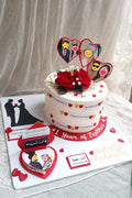 2 pounds cake on try with decorations