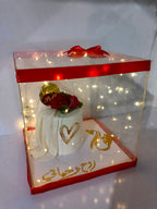 bat pakki cake in acrylic box with kights nad ribbo decore